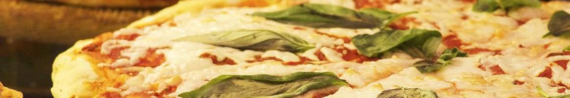 Eating Chicken Wing Italian Pizza Chicken at Classic Crust Pizza Chicken & bar restaurant in Phoenix, AZ.